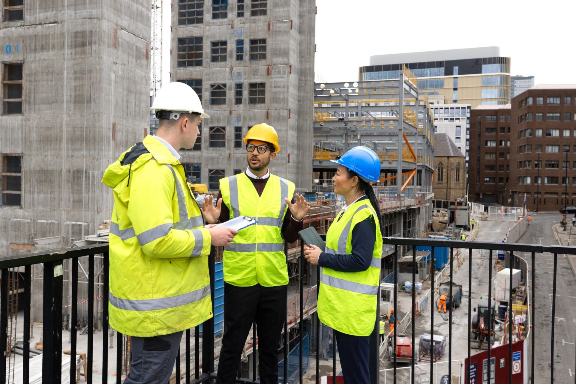 Roofing professionals reviewing repair plans